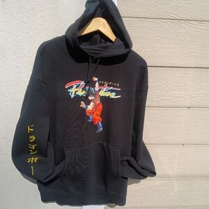 Primitive Black Sweater with Red and Yellow Accents